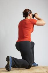 ANGELINA KNEELING POSE WITH SPYGLASS